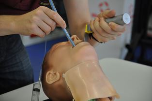 The prototype bougie being used to insert a breathing tube
