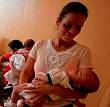 Mother and child wait for vaccine