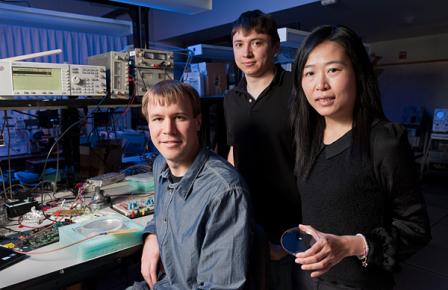 Professor Ada Poon, right, with graduate students Daniel Pivonka, left, and Anatoly Yakovlev, center.